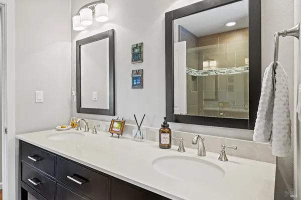 a view of a storage & utility room with a washer dryer