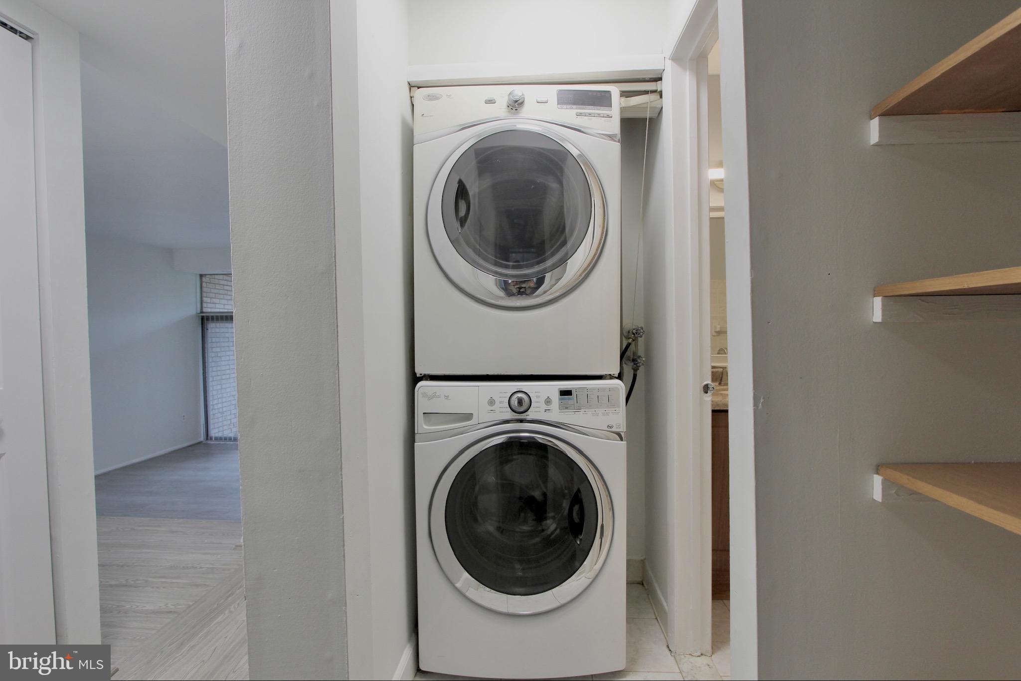 14426 Parkvale Road, Unit 5 Rockville, MD 20853 - Photo 23 of 26 a utility room with dryer and washer