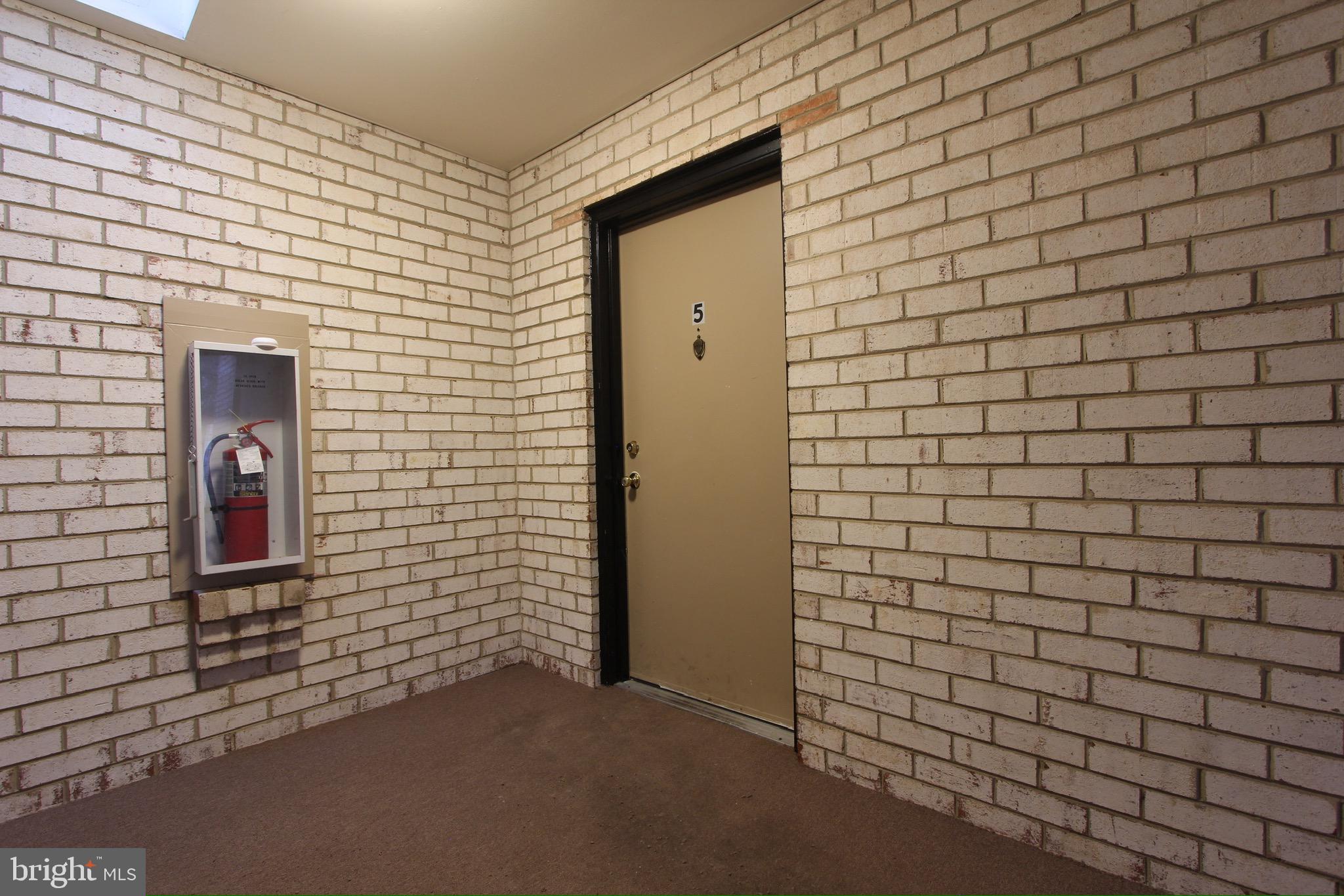 14426 Parkvale Road, Unit 5 Rockville, MD 20853 - Photo 3 of 26 a view of door