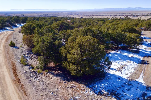 a view of a city with mountains in the background