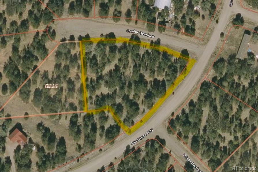 2058 Condor Overlook, Unit OVERLOOK Crestone, CO 81131 - Photo 24 of 24 a view of a yard with plants and wooden bench