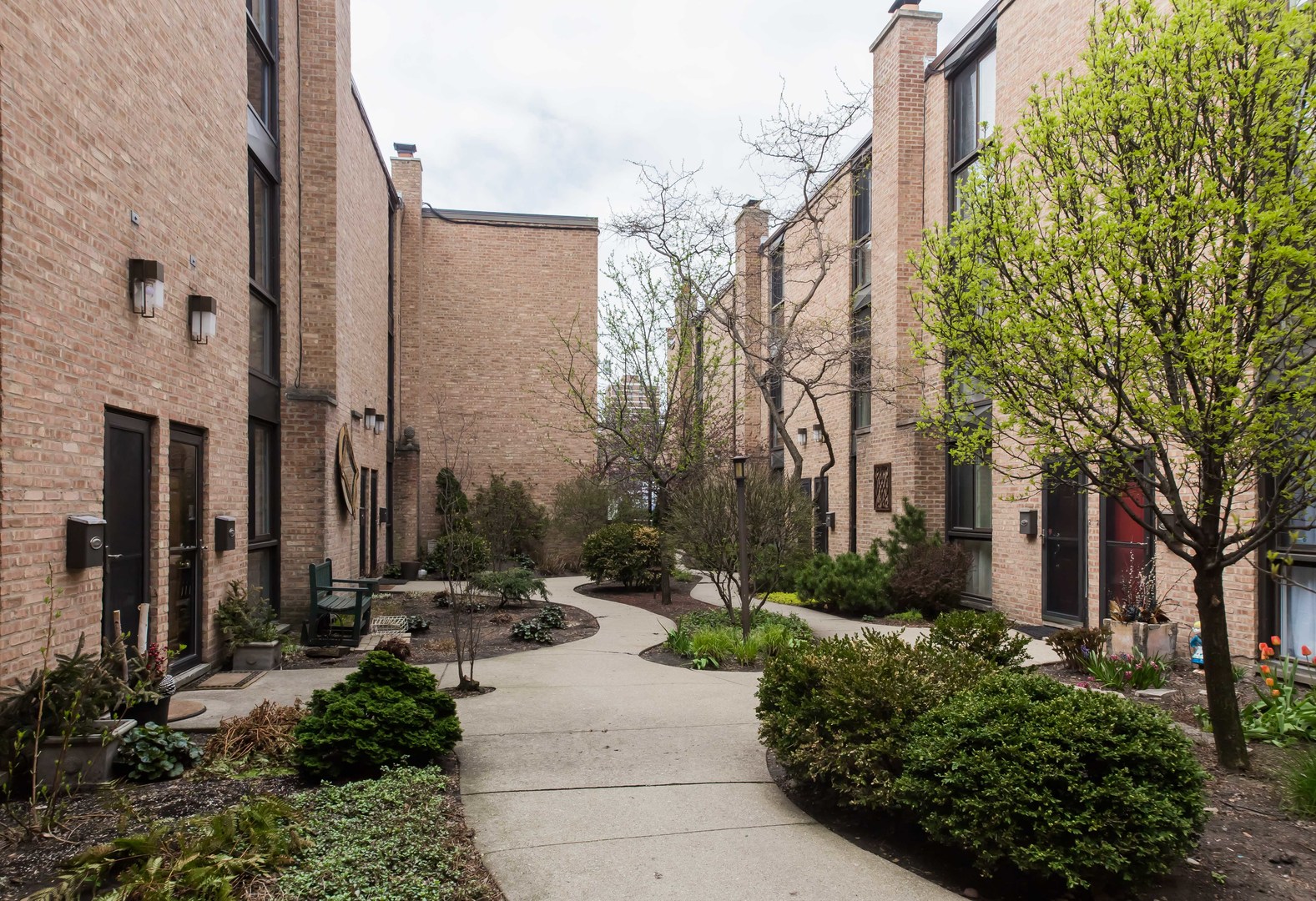 3012 North Waterloo Court, Unit 5 Chicago, IL 60657 - Photo 2 of 19 a view of a pathway along the path of a building
