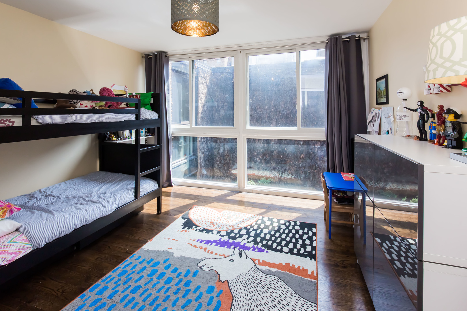 3012 North Waterloo Court, Unit 5 Chicago, IL 60657 - Photo 13 of 19 a bedroom with a bed and a window