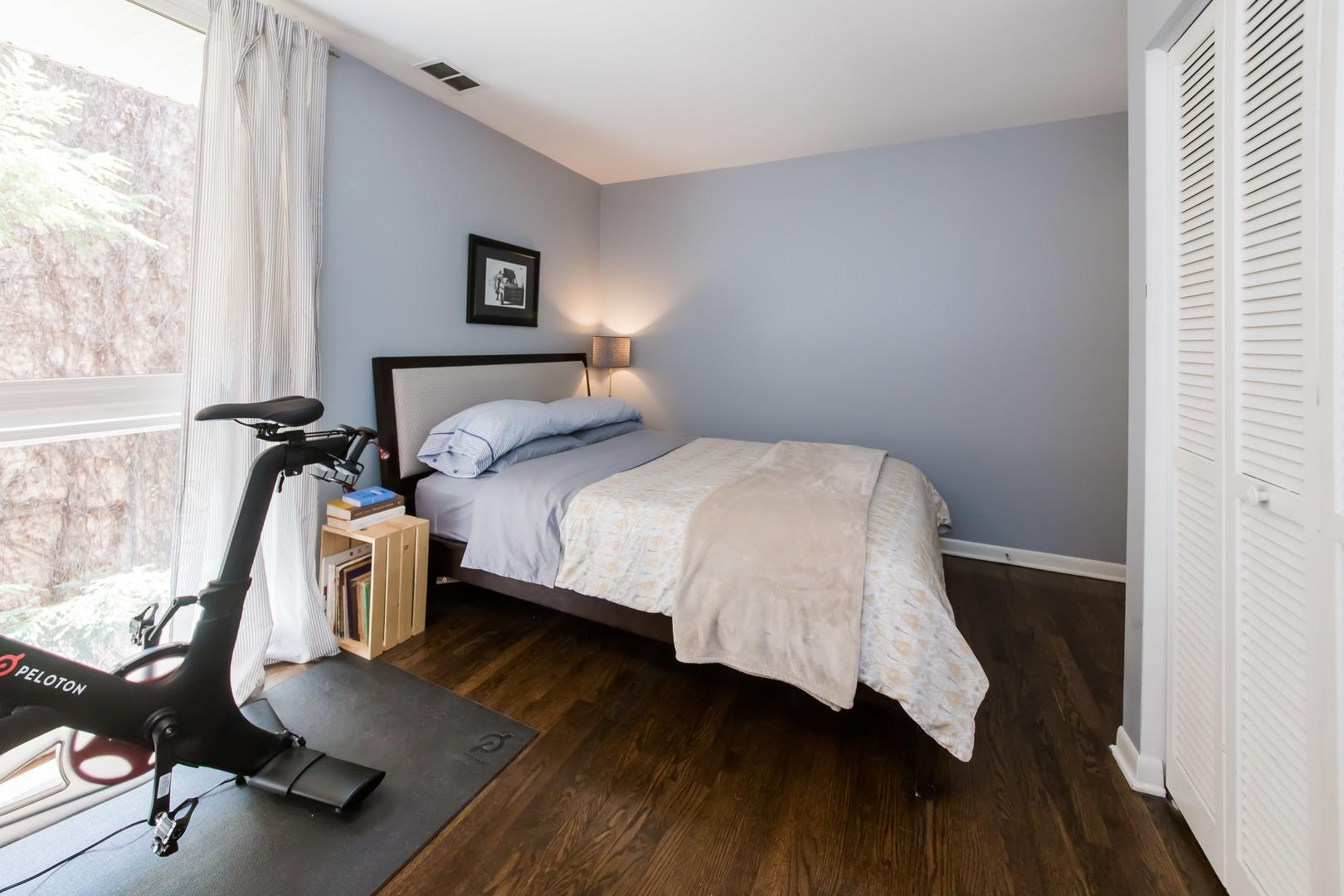 3012 North Waterloo Court, Unit 5 Chicago, IL 60657 - Photo 14 of 19 a bedroom with a bed and wooden floor