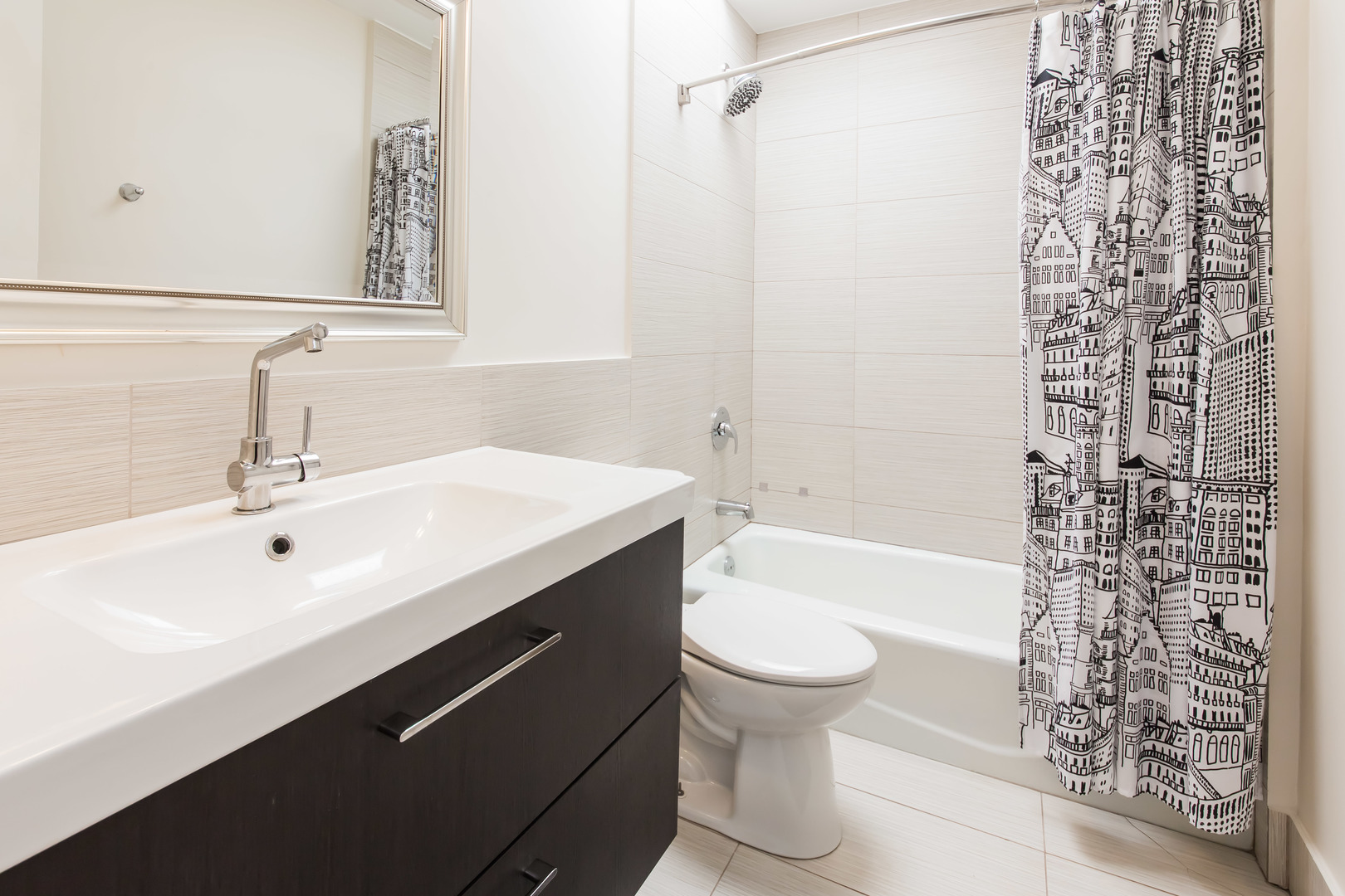 3012 North Waterloo Court, Unit 5 Chicago, IL 60657 - Photo 15 of 19 a bathroom with a sink toilet and shower