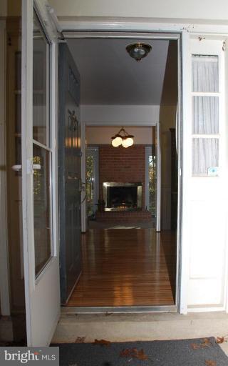 11313 Handlebar Road Reston, VA 20191 - Photo 20 of 29 Spacious Foyer View of FP in Family Room