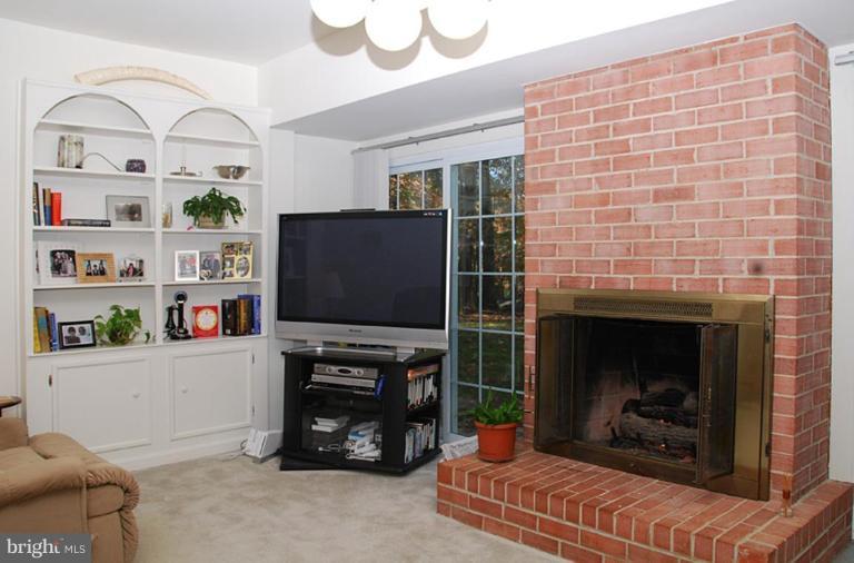 11313 Handlebar Road Reston, VA 20191 - Photo 8 of 29 Gas Fireplace & Built-in-Cabinets