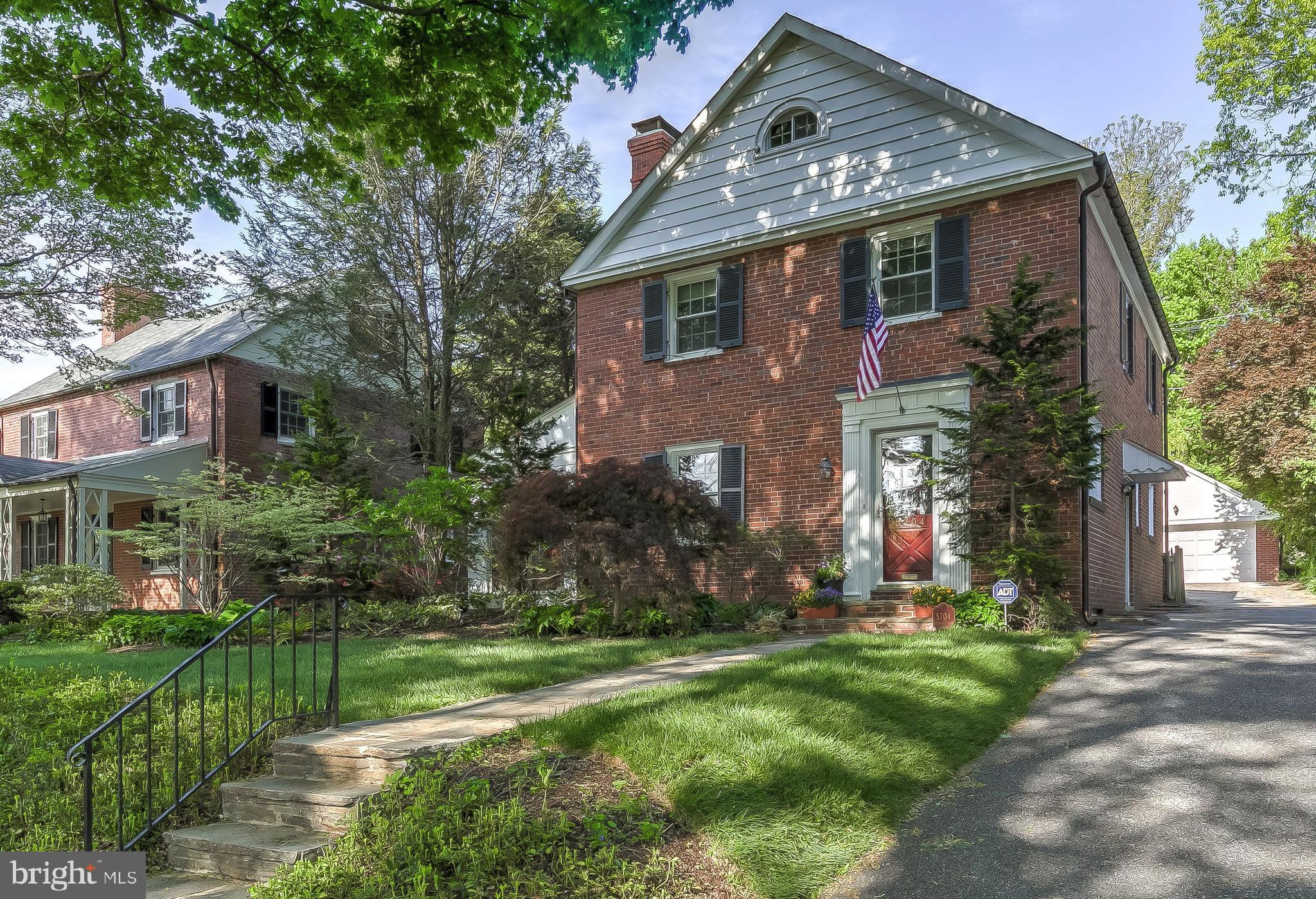 5704 Kenmore Road Baltimore, MD 21210 - Photo 1 of 30 a front view of a house with a yard