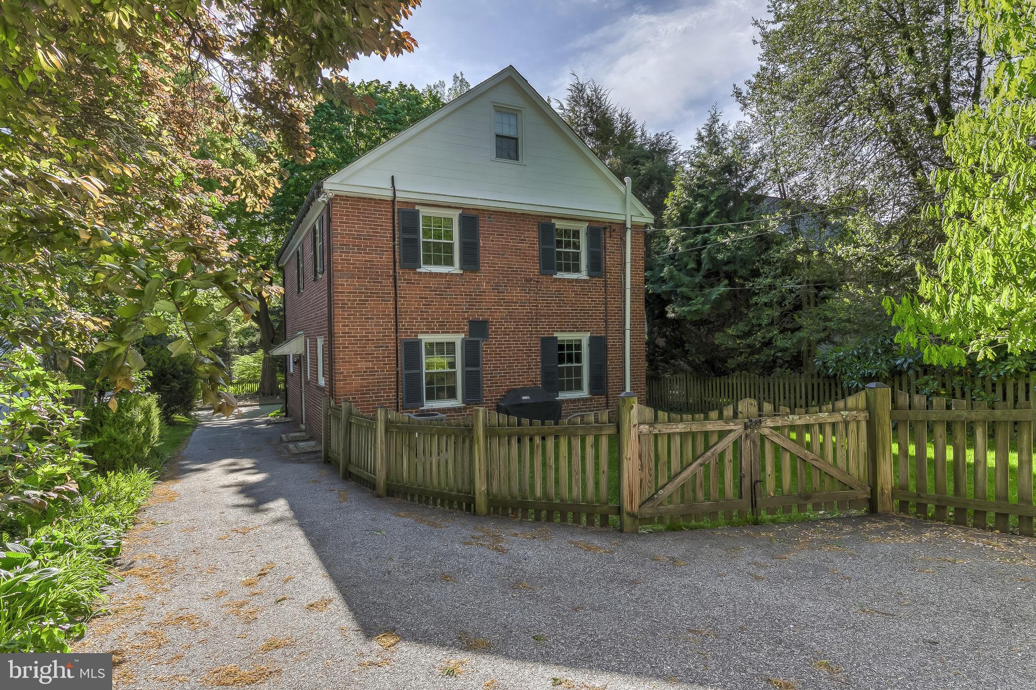 5704 Kenmore Road Baltimore, MD 21210 - Photo 26 of 30 a view of a small yard in front of a house with a small yard