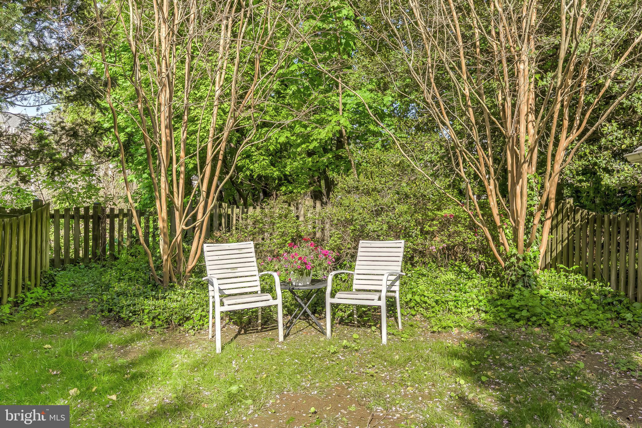 5704 Kenmore Road Baltimore, MD 21210 - Photo 29 of 30 a chairs and a table in a garden