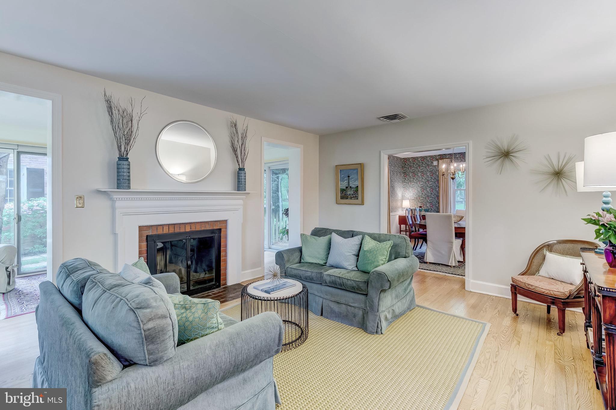 5704 Kenmore Road Baltimore, MD 21210 - Photo 4 of 30 a living room with furniture and a fireplace