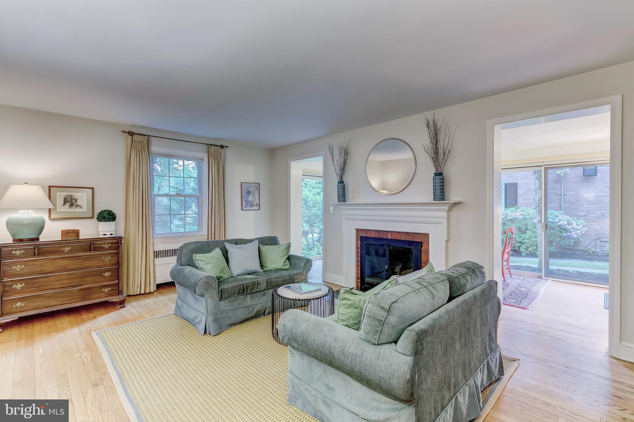 5704 Kenmore Road Baltimore, MD 21210 - Photo 5 of 30 a living room with furniture and a fireplace