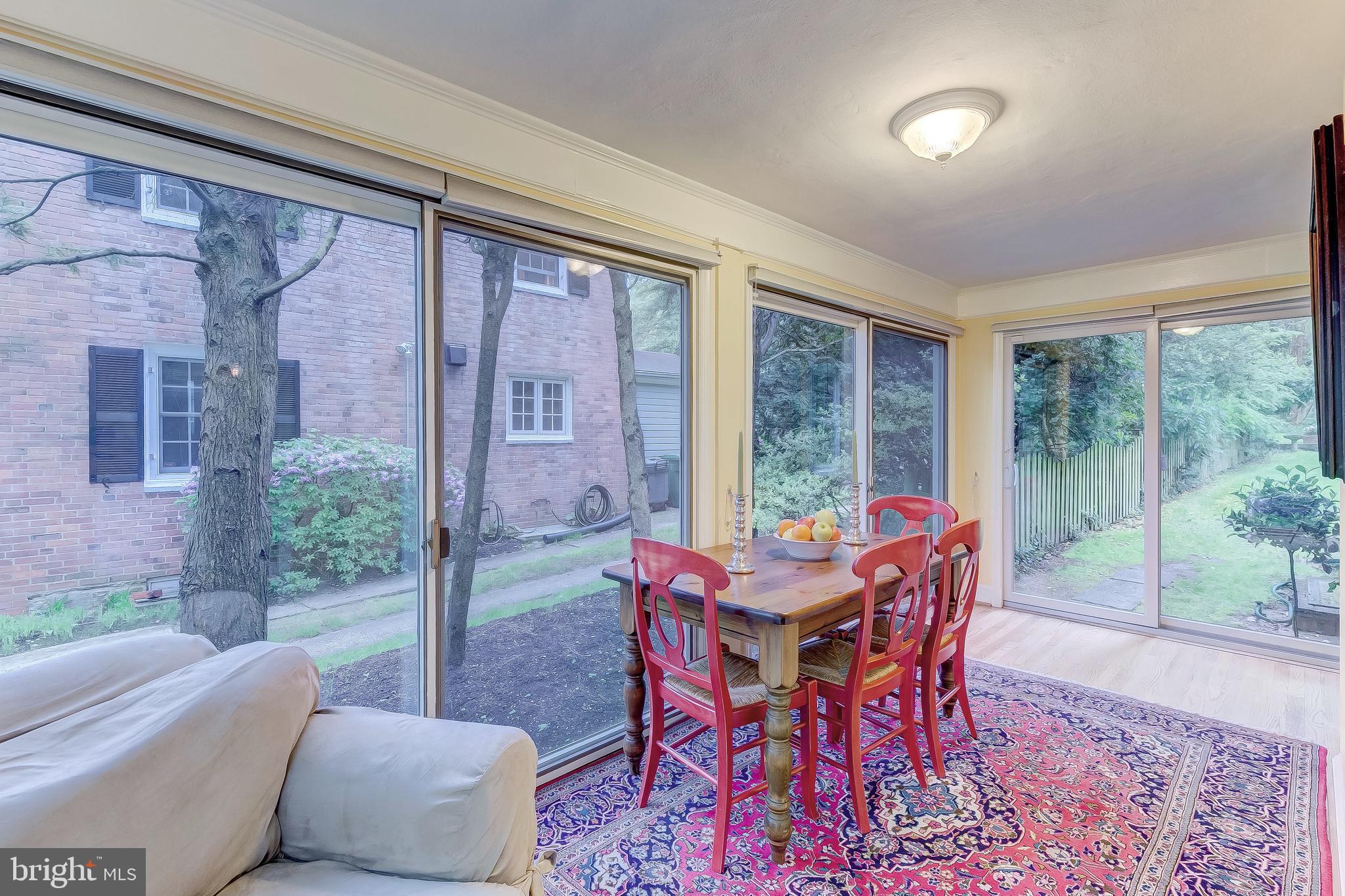 5704 Kenmore Road Baltimore, MD 21210 - Photo 6 of 30 a dining room with furniture and wooden floor