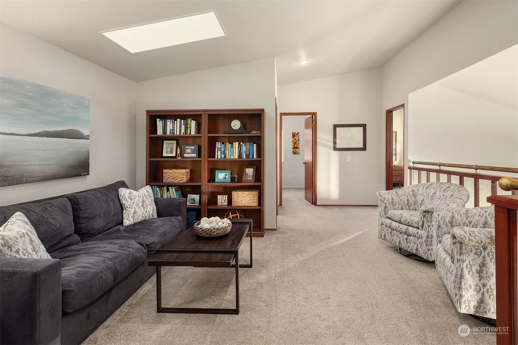 3480 Timothy Way Camano Island, WA 98282 - Photo 16 of 39 a living room with furniture and painting on the wall