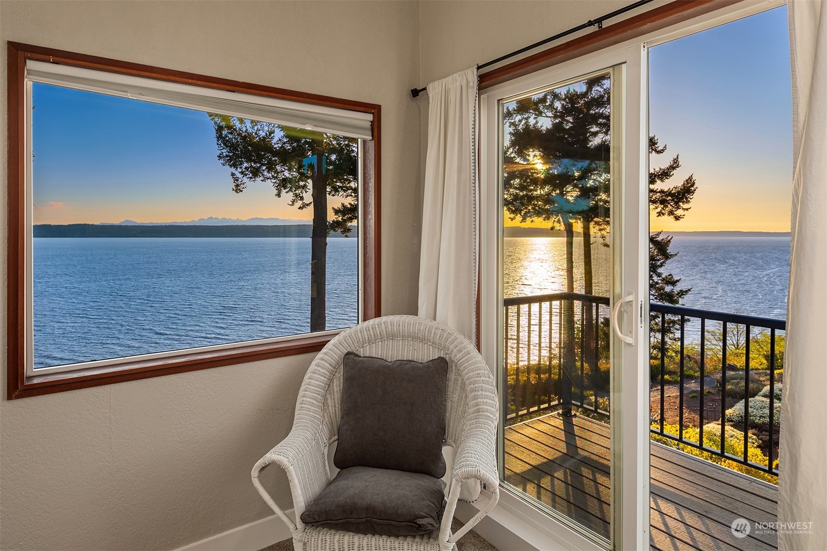 3480 Timothy Way Camano Island, WA 98282 - Photo 20 of 39 a blue chair sitting in front of a window