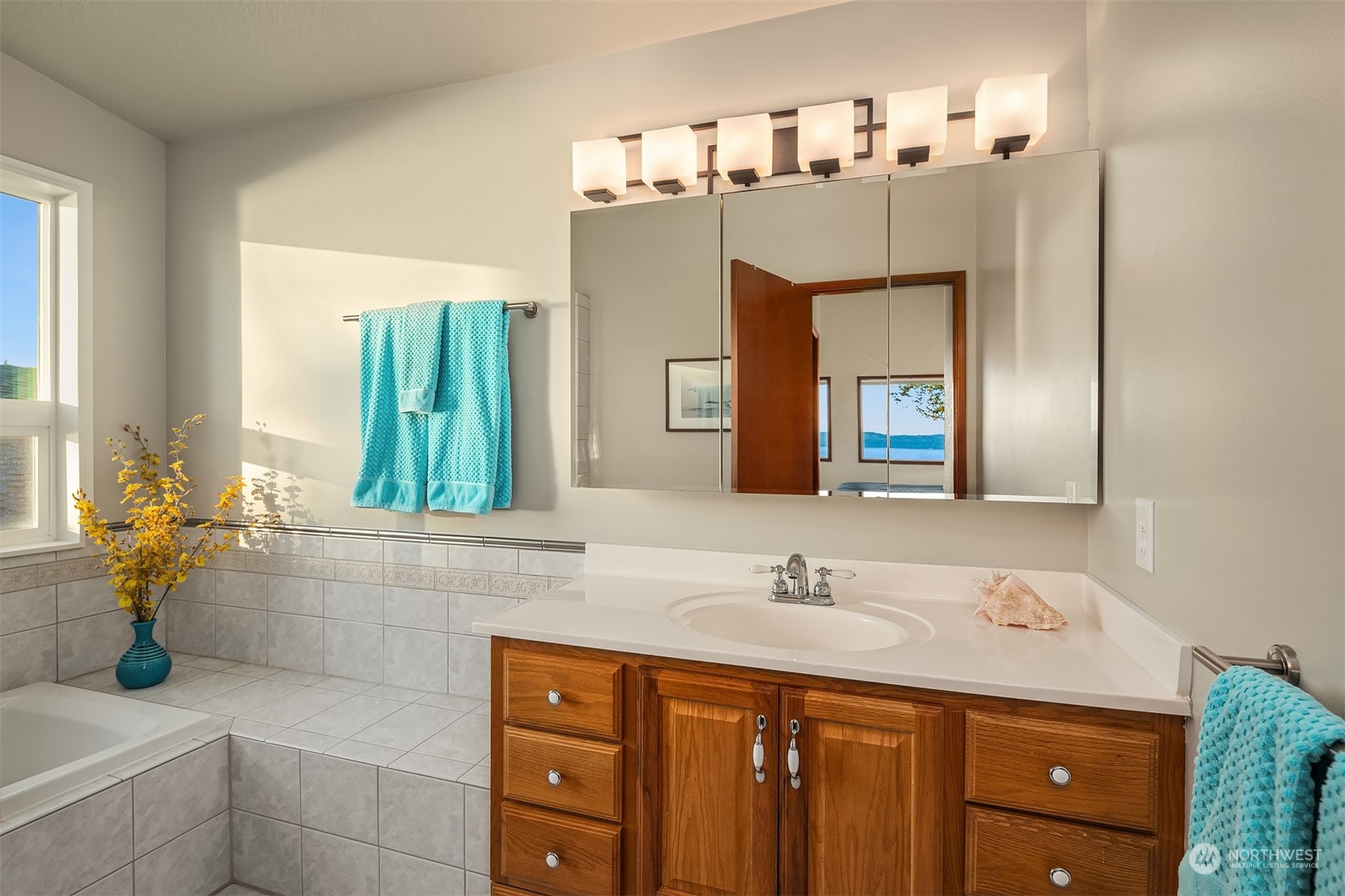 3480 Timothy Way Camano Island, WA 98282 - Photo 21 of 39 a bathroom with a sink and a mirror