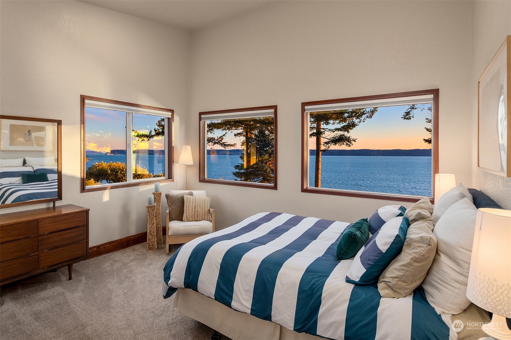 3480 Timothy Way Camano Island, WA 98282 - Photo 22 of 39 a bedroom with a bed and wooden floor