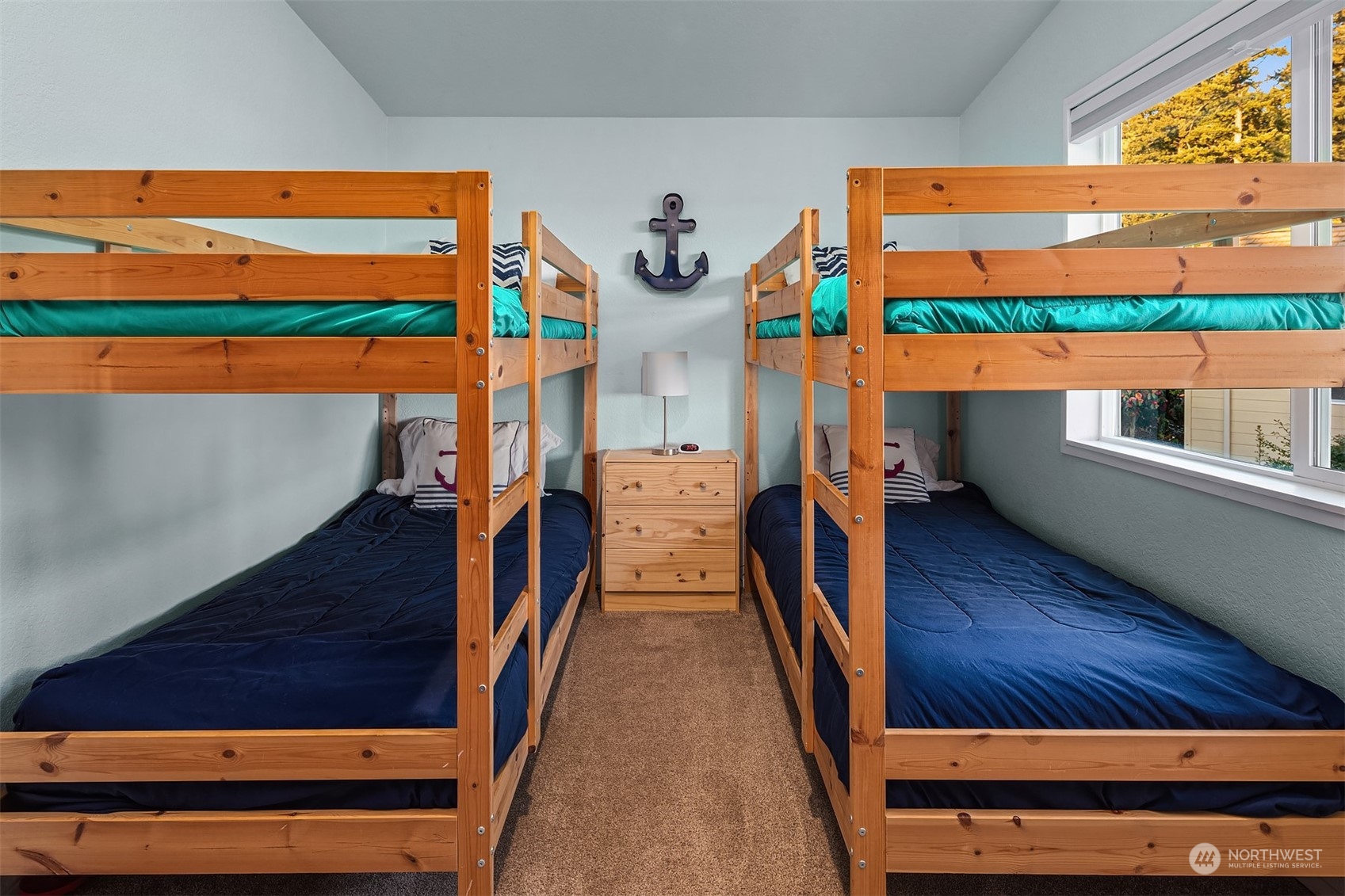 3480 Timothy Way Camano Island, WA 98282 - Photo 24 of 39 a view of living room with furniture and floor to ceiling window
