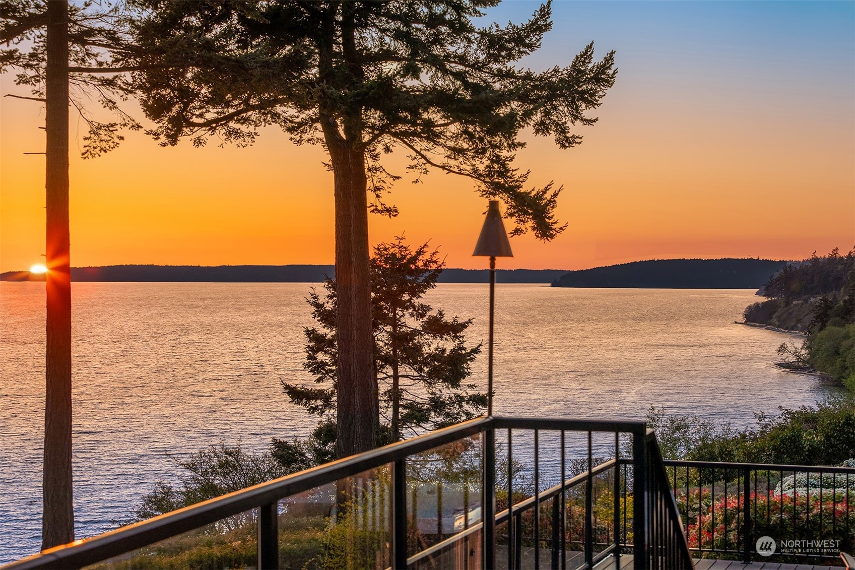 3480 Timothy Way Camano Island, WA 98282 - Photo 28 of 39 a view of a balcony next to a large ocean