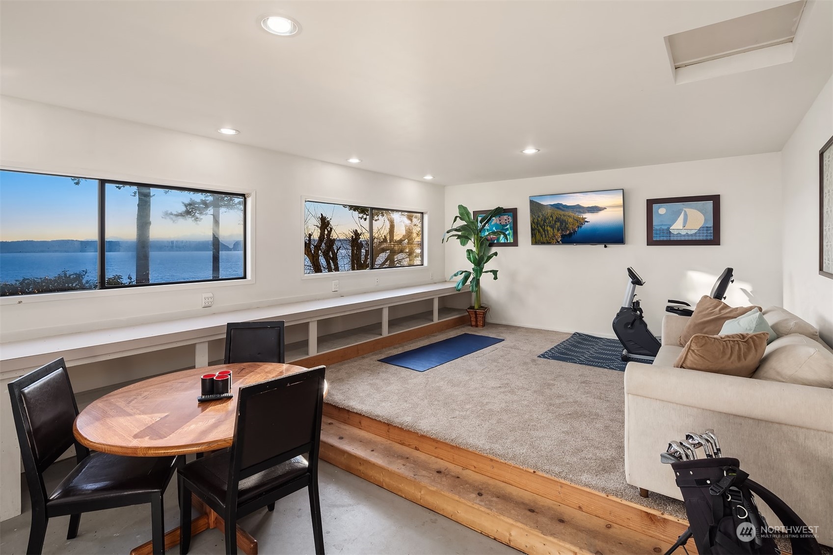 3480 Timothy Way Camano Island, WA 98282 - Photo 32 of 39 a living room with furniture and a wooden floor