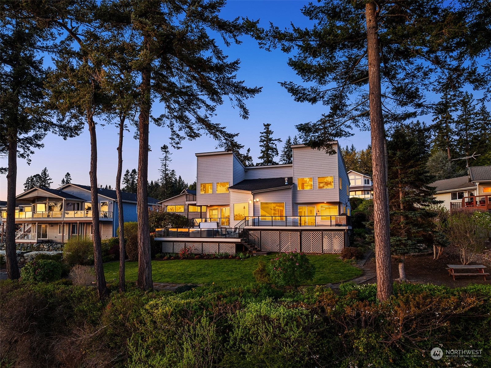 3480 Timothy Way Camano Island, WA 98282 - Photo 35 of 39 a view of a yard with plants and a bench