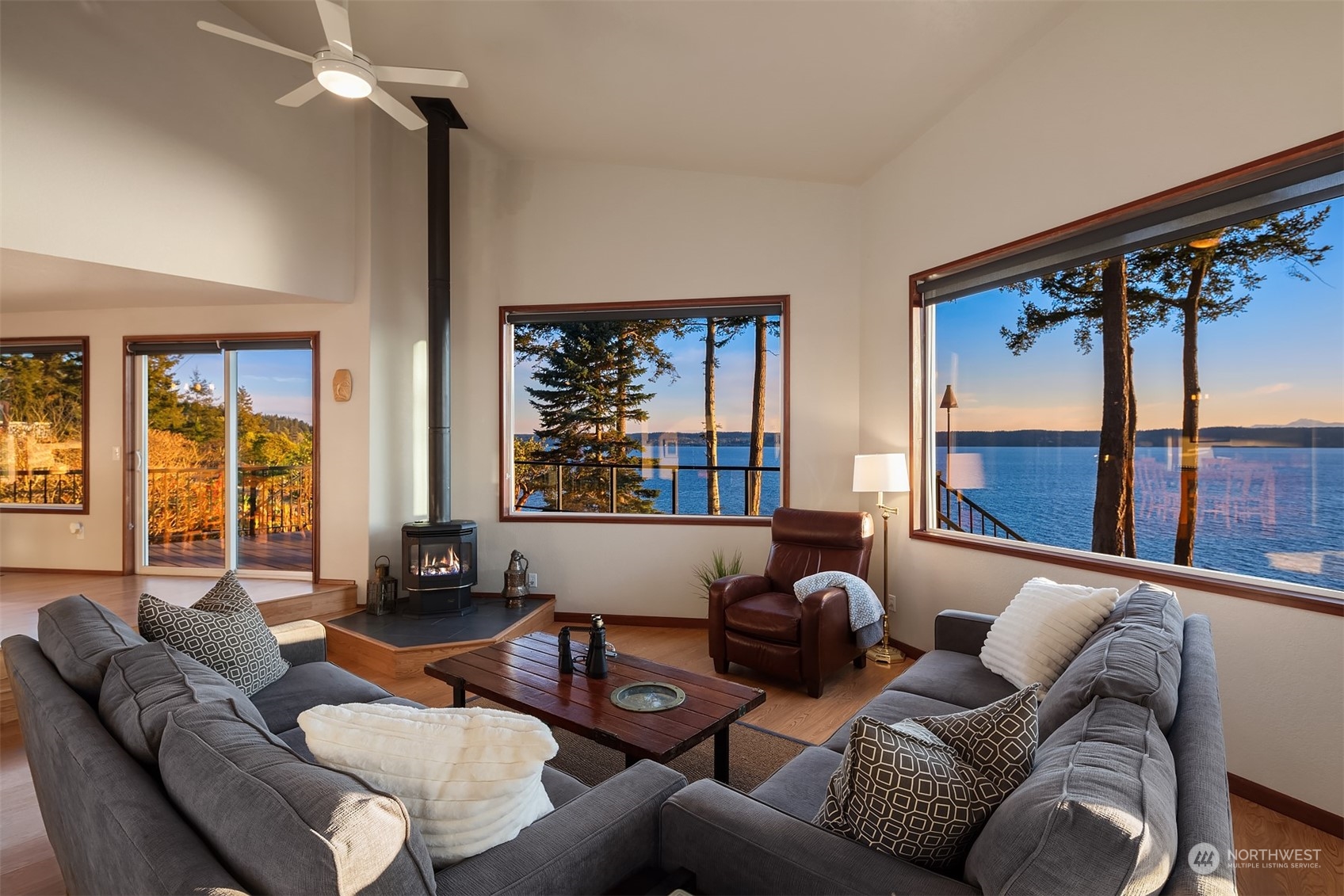 3480 Timothy Way Camano Island, WA 98282 - Photo 6 of 39 a living room with furniture and a large window