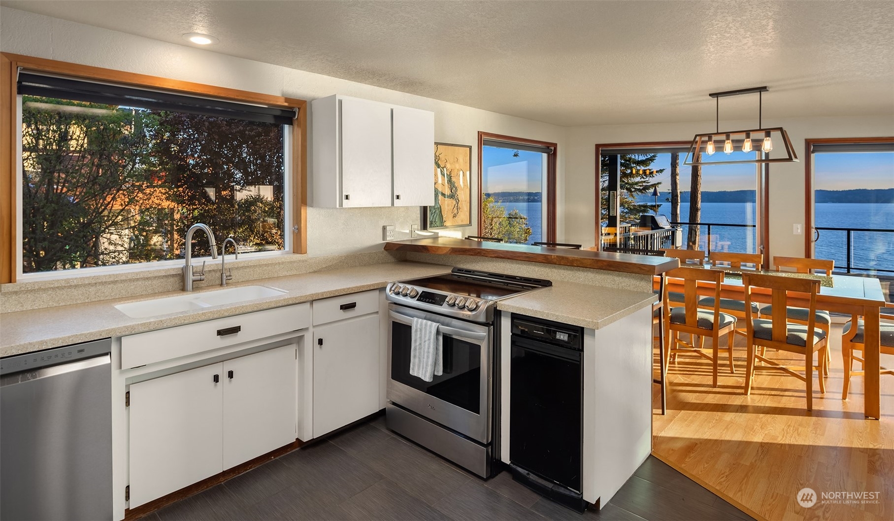 3480 Timothy Way Camano Island, WA 98282 - Photo 9 of 39 a kitchen with stainless steel appliances granite countertop a stove and a sink