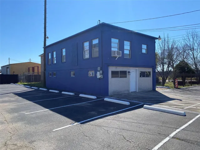 a view of a house and a yard