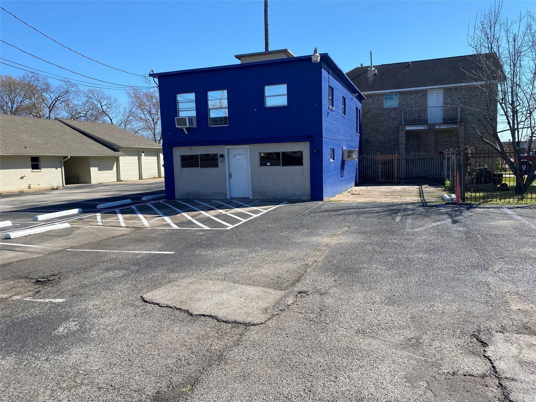 3427 Federal Road Pasadena, TX 77504 - Photo 16 of 17 a big house with large windows