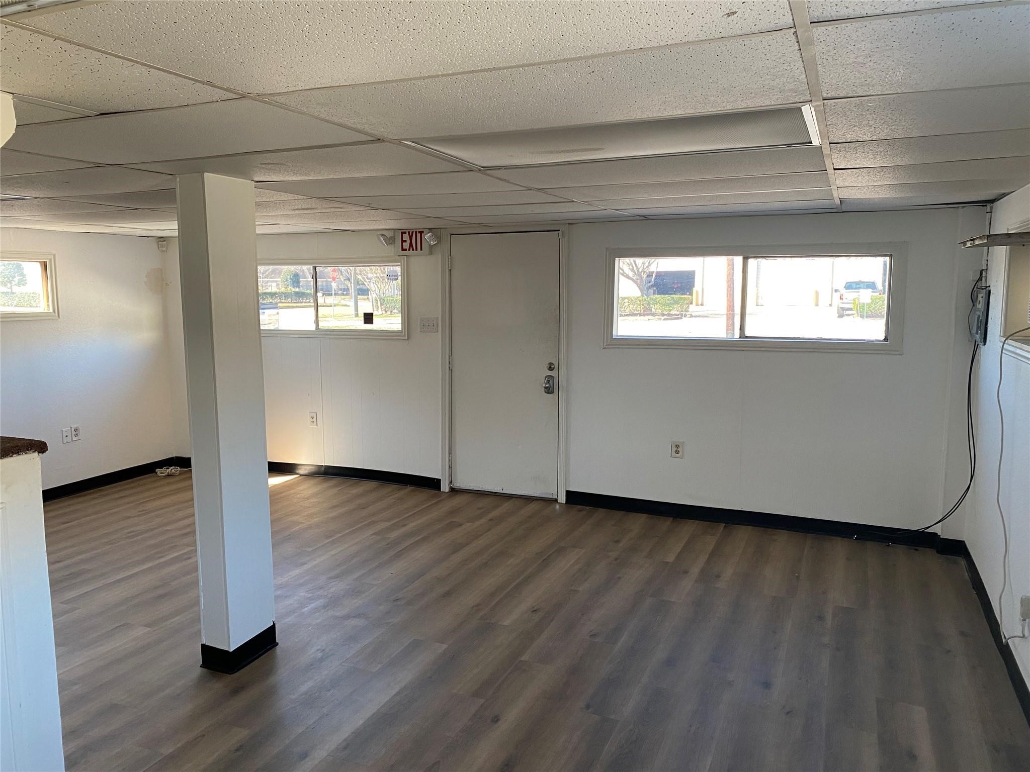 3427 Federal Road Pasadena, TX 77504 - Photo 4 of 17 a view of empty room with wooden floor and fan