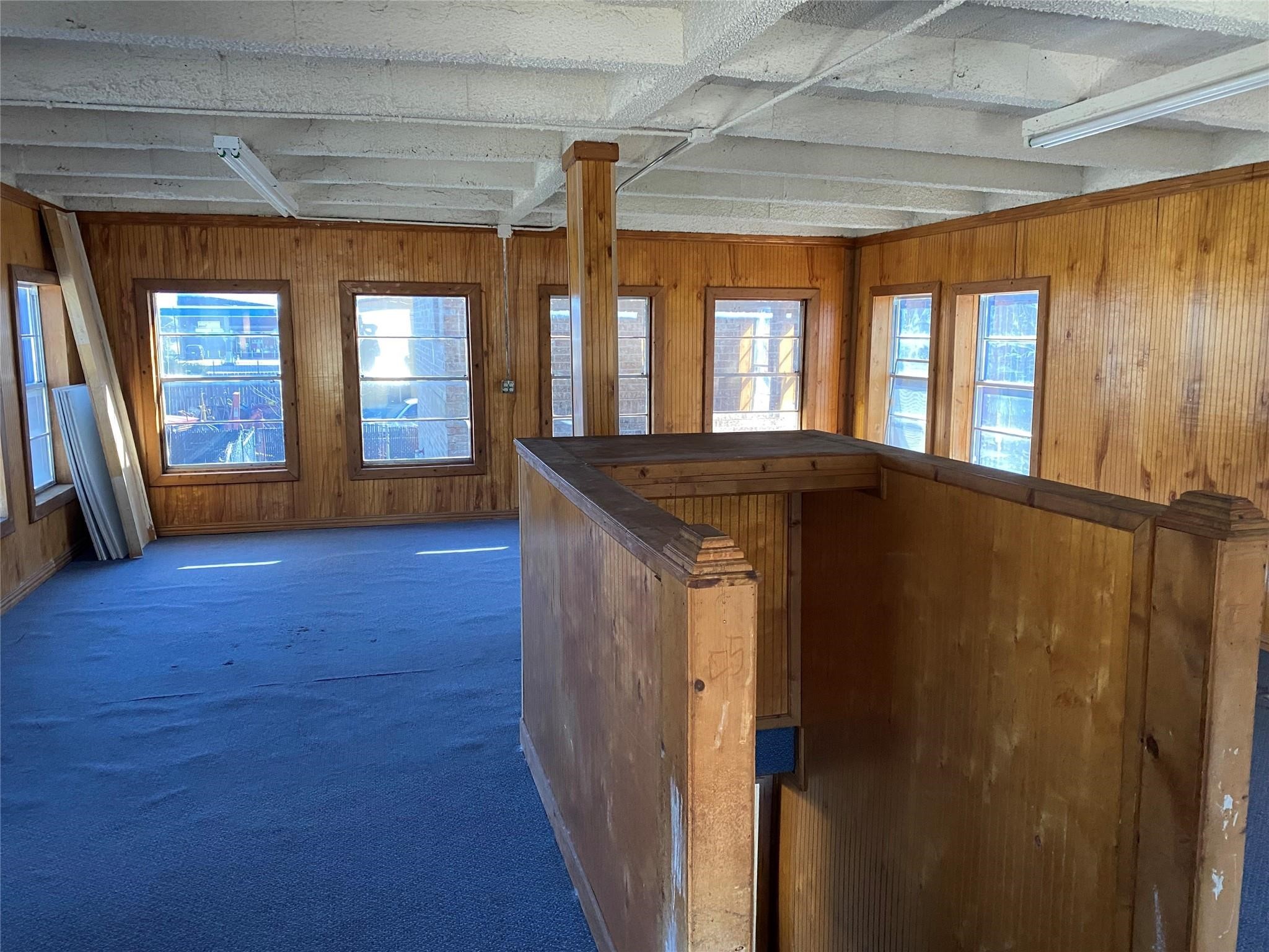 3427 Federal Road Pasadena, TX 77504 - Photo 8 of 17 a kitchen with stainless steel appliances granite countertop a refrigerator a sink a stove and wooden floors
