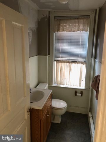 a view of a entryway with wooden floor