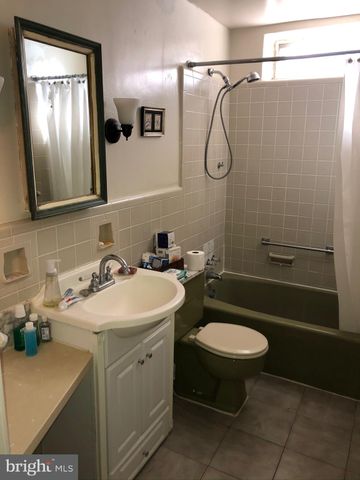 a view of front door with wooden floor