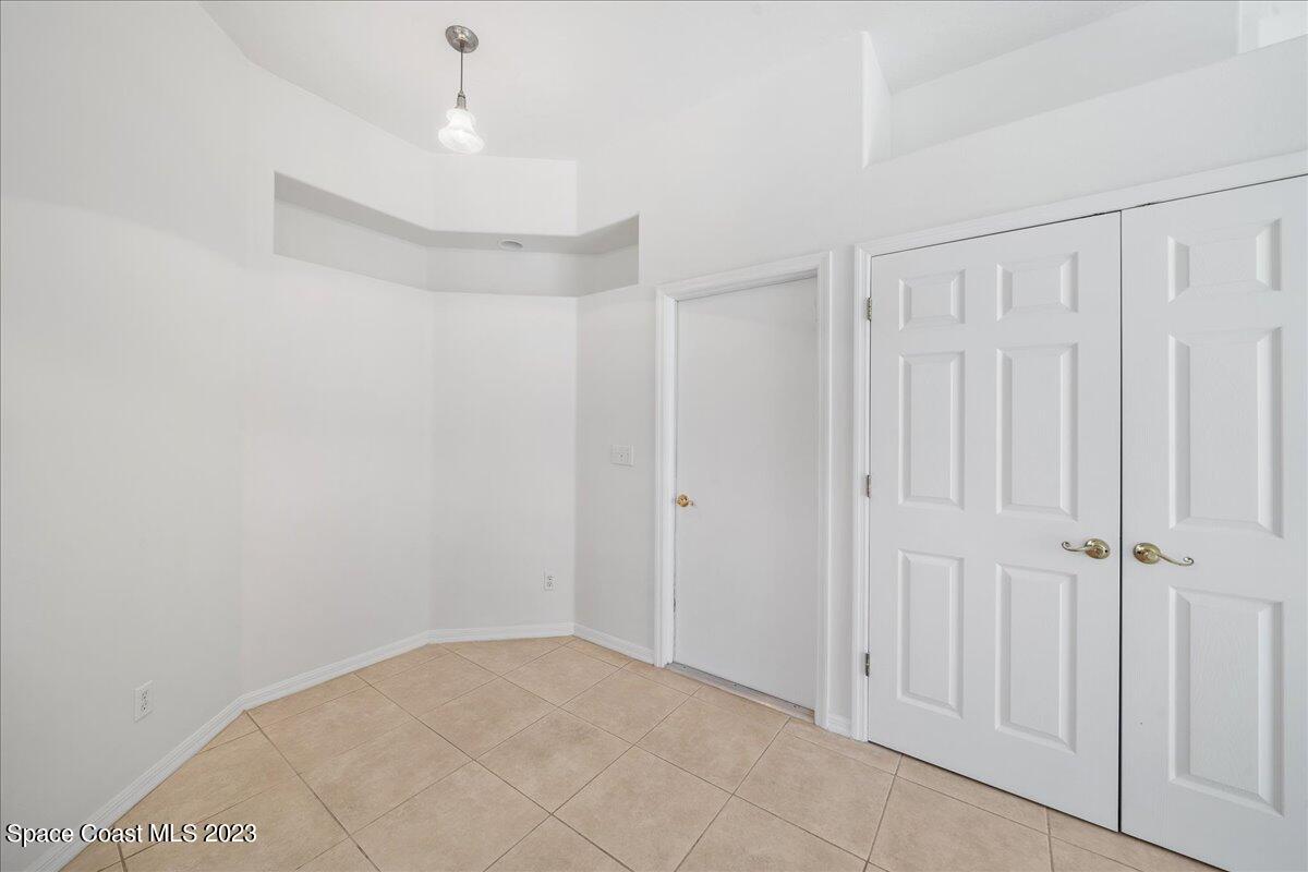 853 Villa Drive Melbourne, FL 32940 - Photo 15 of 28 a view of an empty room