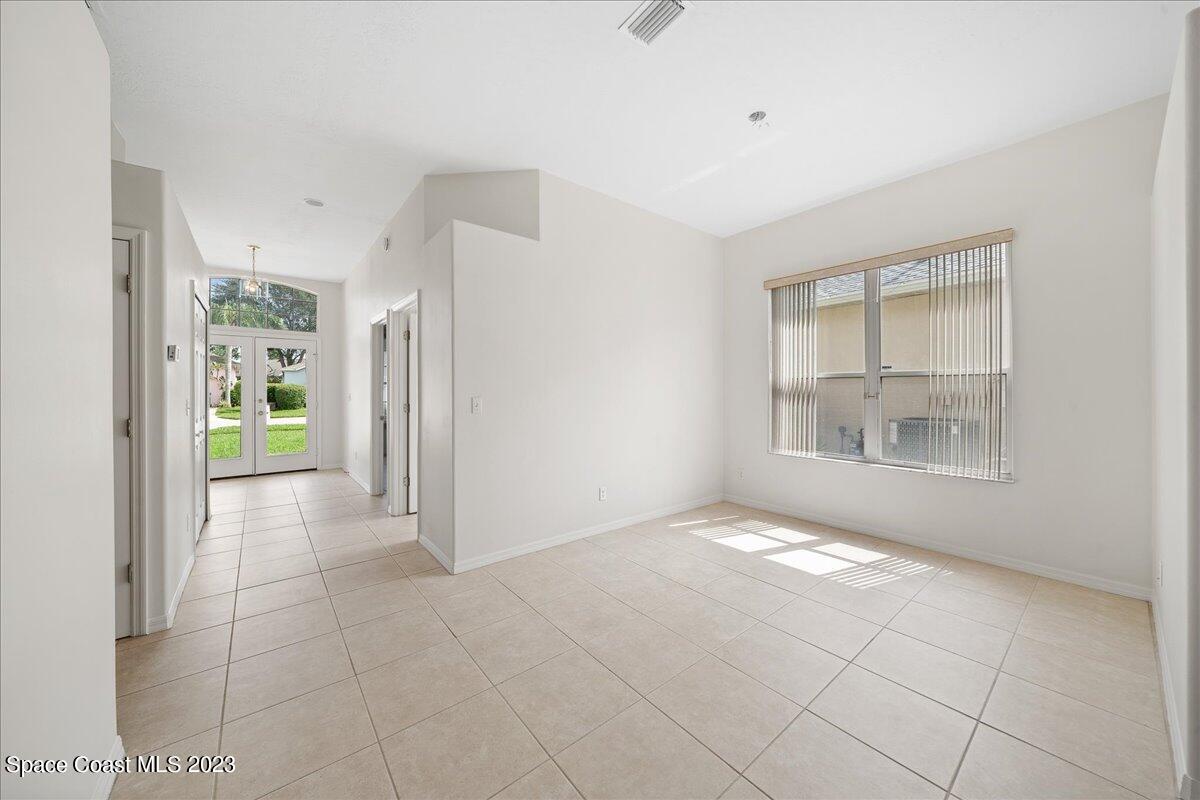 853 Villa Drive Melbourne, FL 32940 - Photo 5 of 28 a view of an empty room with a window