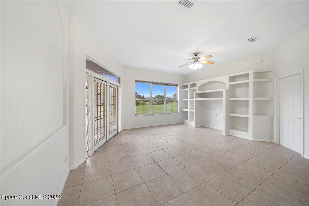 853 Villa Drive Melbourne, FL 32940 - Photo 9 of 28 a view of an empty room with a window