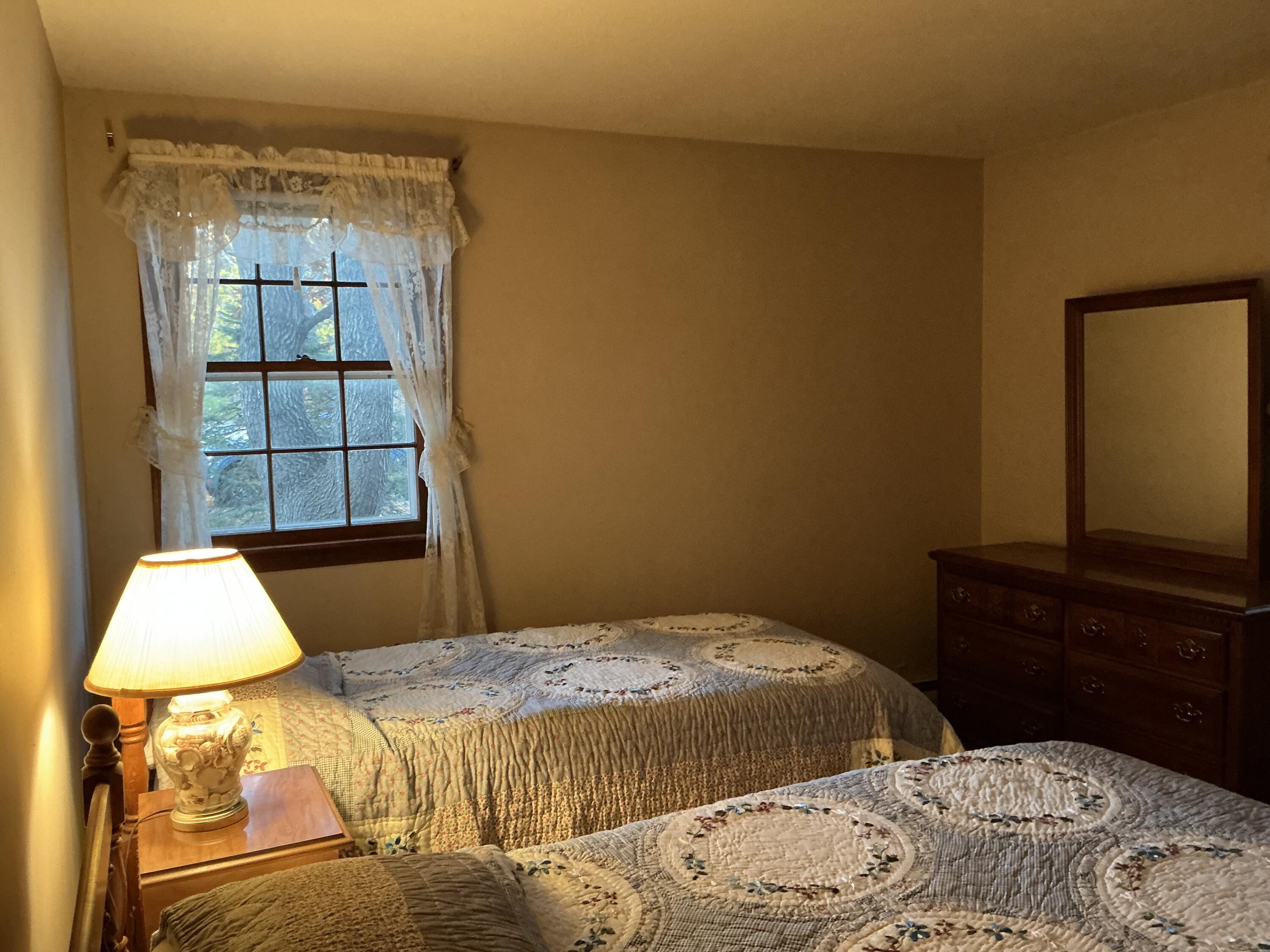 29 Windshore Drive Hyannis, MA 02601 - Photo 13 of 32 a bedroom with a bed and a window