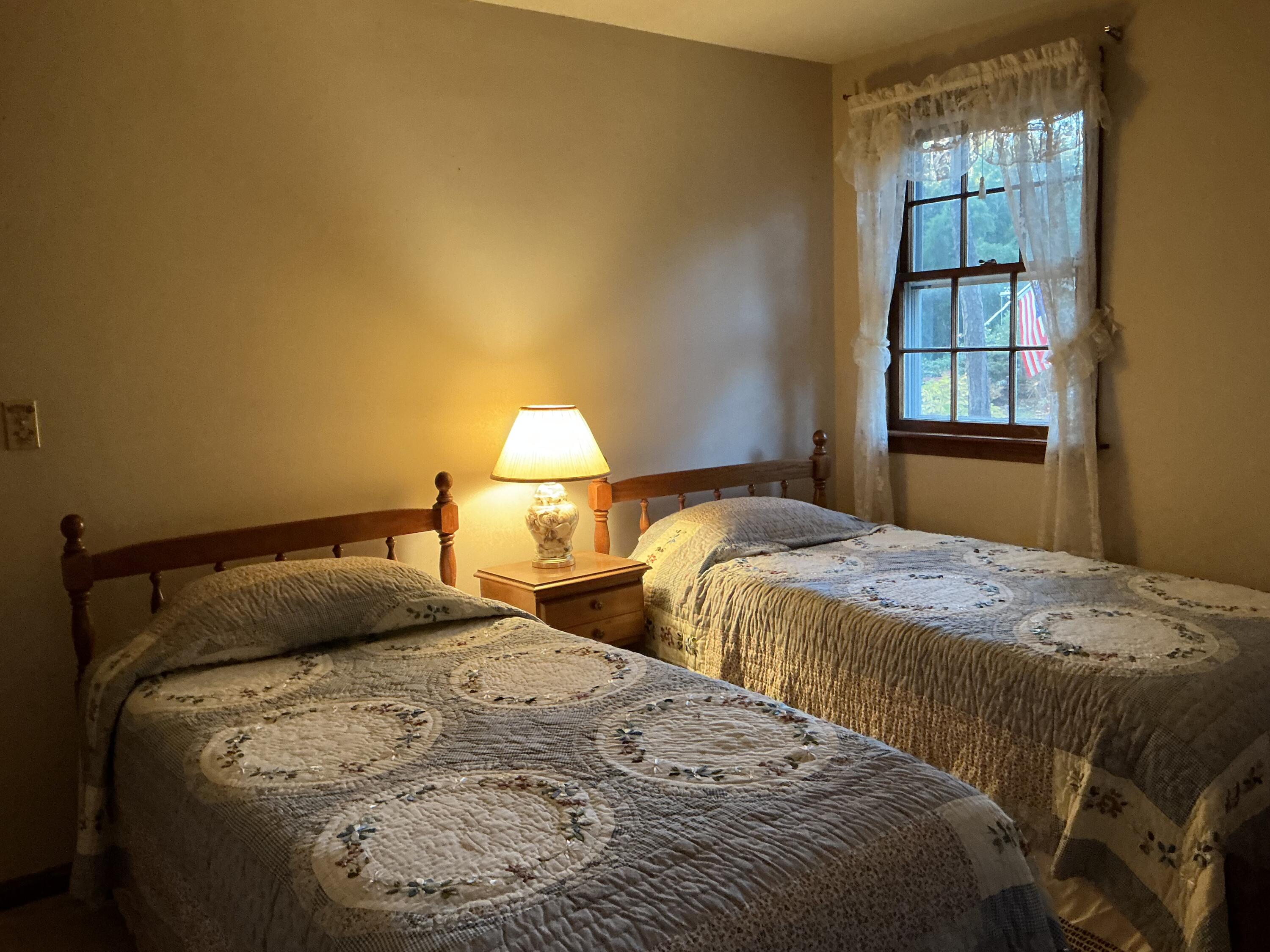 29 Windshore Drive Hyannis, MA 02601 - Photo 15 of 32 a bedroom with a bed and window