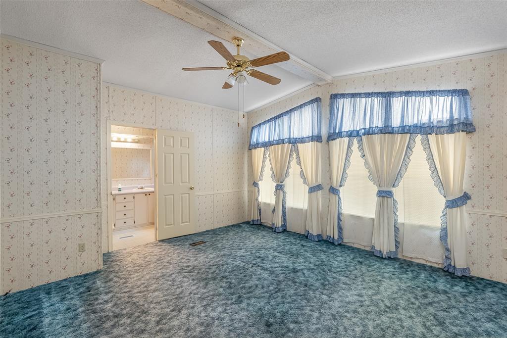 121 Woolworth Road Stonewall, LA 71078 - Photo 14 of 32 a view of empty room with ceiling fan