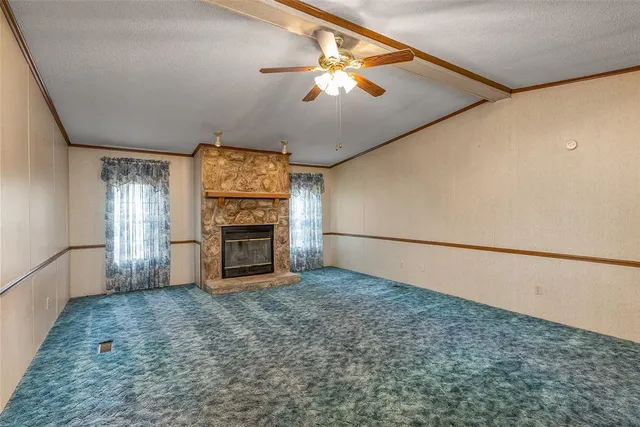 a view of a livingroom with a fireplace