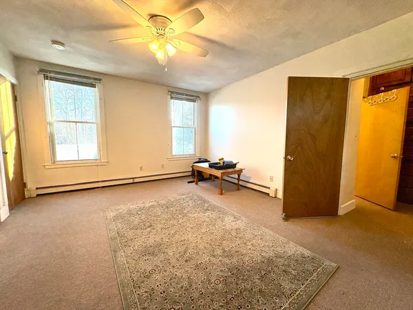 a view of a livingroom with a flat screen tv