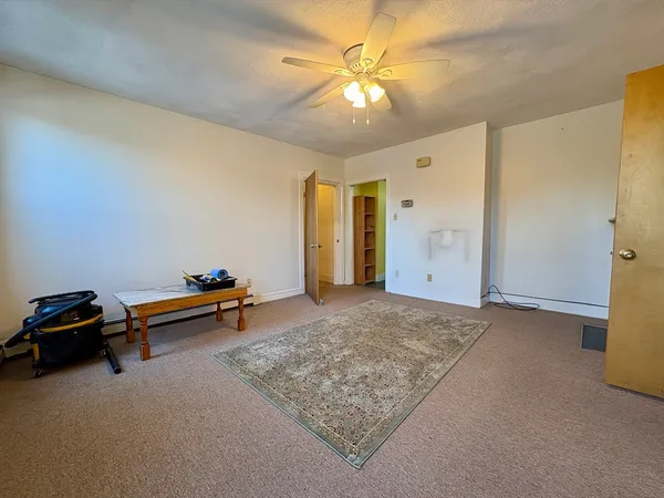 a view of livingroom with workspace