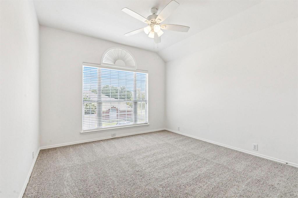6439 Chester Drive Frisco, TX 75035 - Photo 9 of 12 an empty room with windows and fan