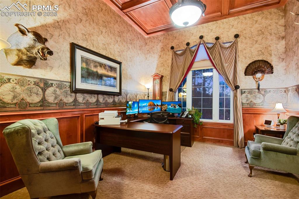 16075 Winding Trail Road Colorado Springs, CO 80908 - Photo 20 of 42 a living room with furniture and a window