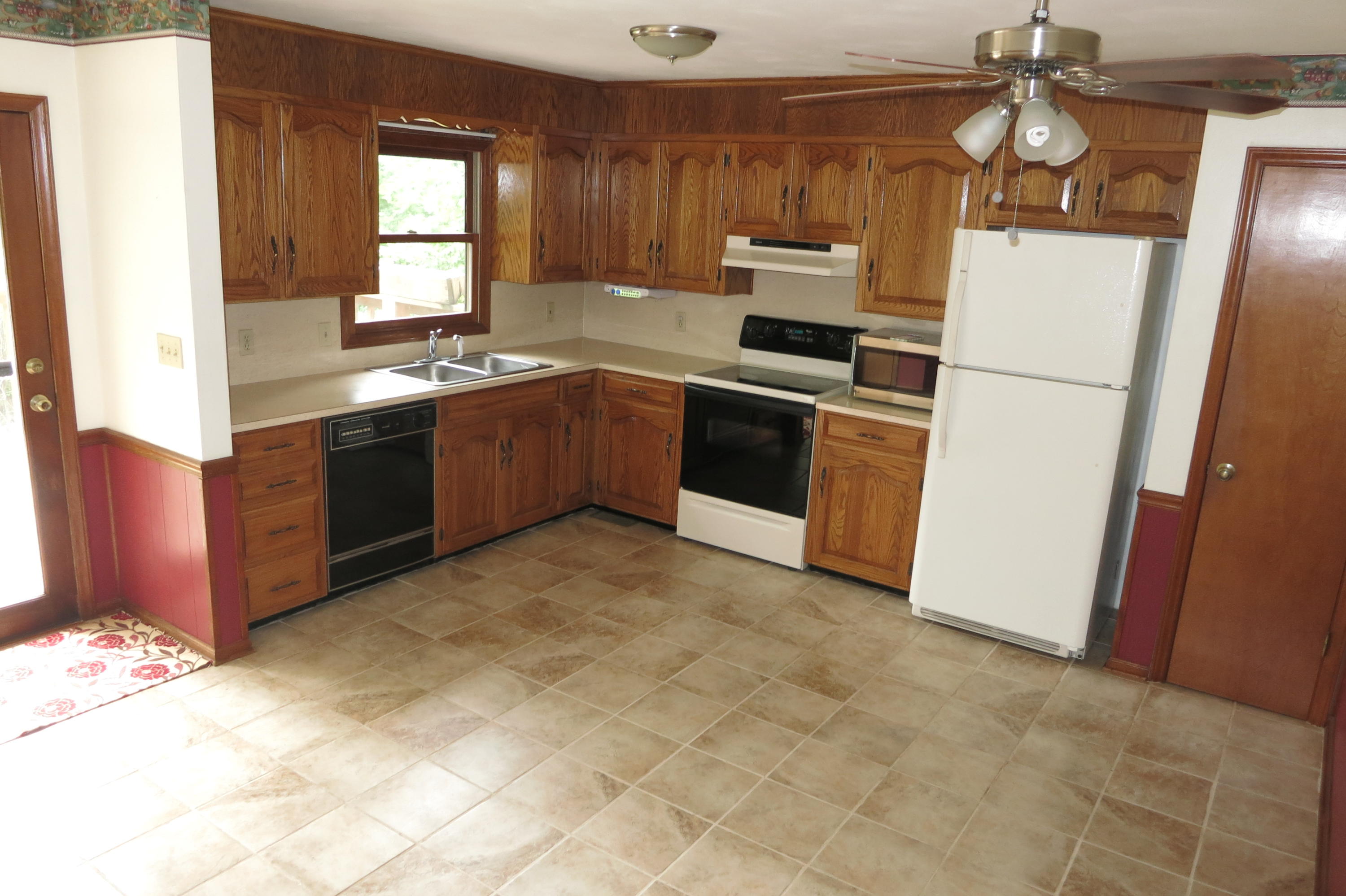 4432 Nemmo Road Vinton, VA 24179 - Photo 14 of 44 a kitchen with stainless steel appliances granite countertop a refrigerator a stove and a sink
