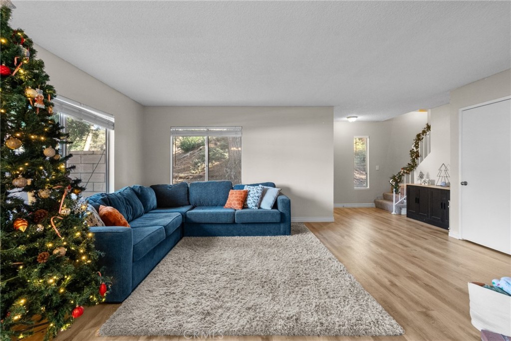 31363 The Old Road, Unit A Castaic, CA 91384 - Photo 11 of 43 a living room with furniture and a christmas tree