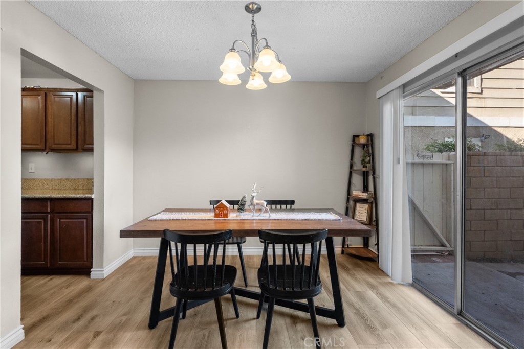 31363 The Old Road, Unit A Castaic, CA 91384 - Photo 13 of 43 a dining room with furniture and window
