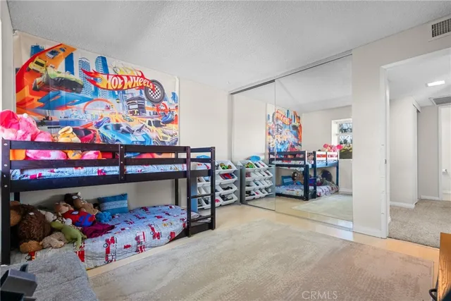 a children room with toys and a couch