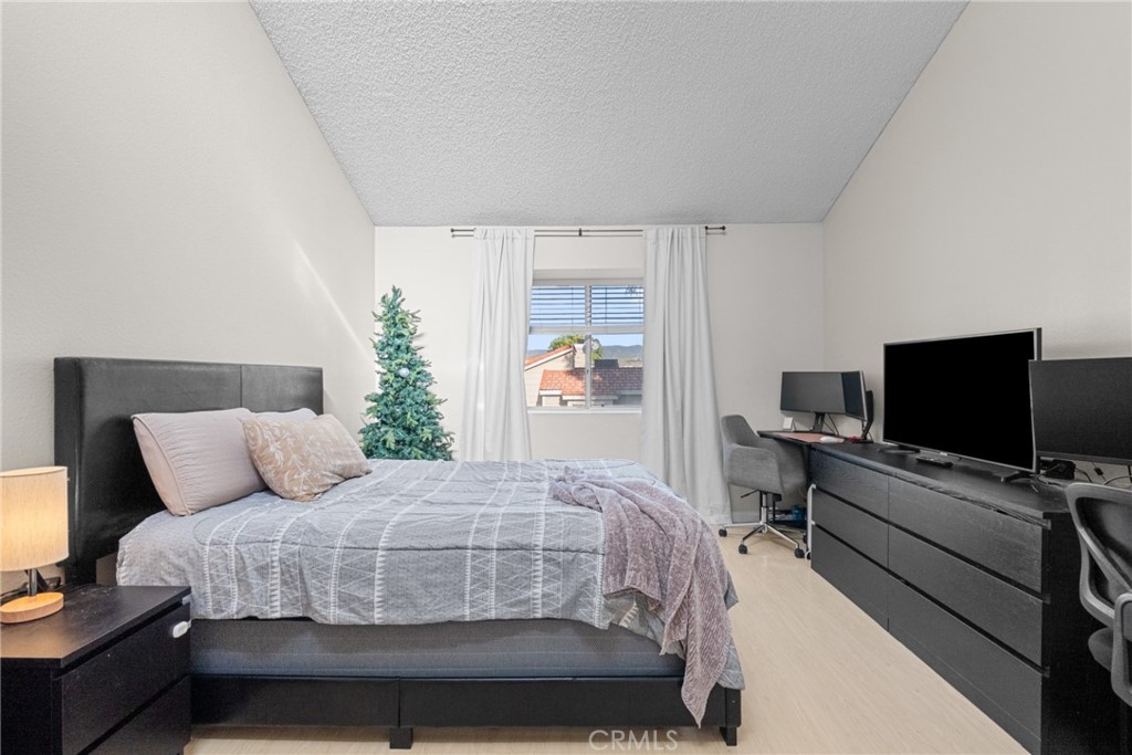 31363 The Old Road, Unit A Castaic, CA 91384 - Photo 30 of 43 a bedroom with a bed and a flat screen tv