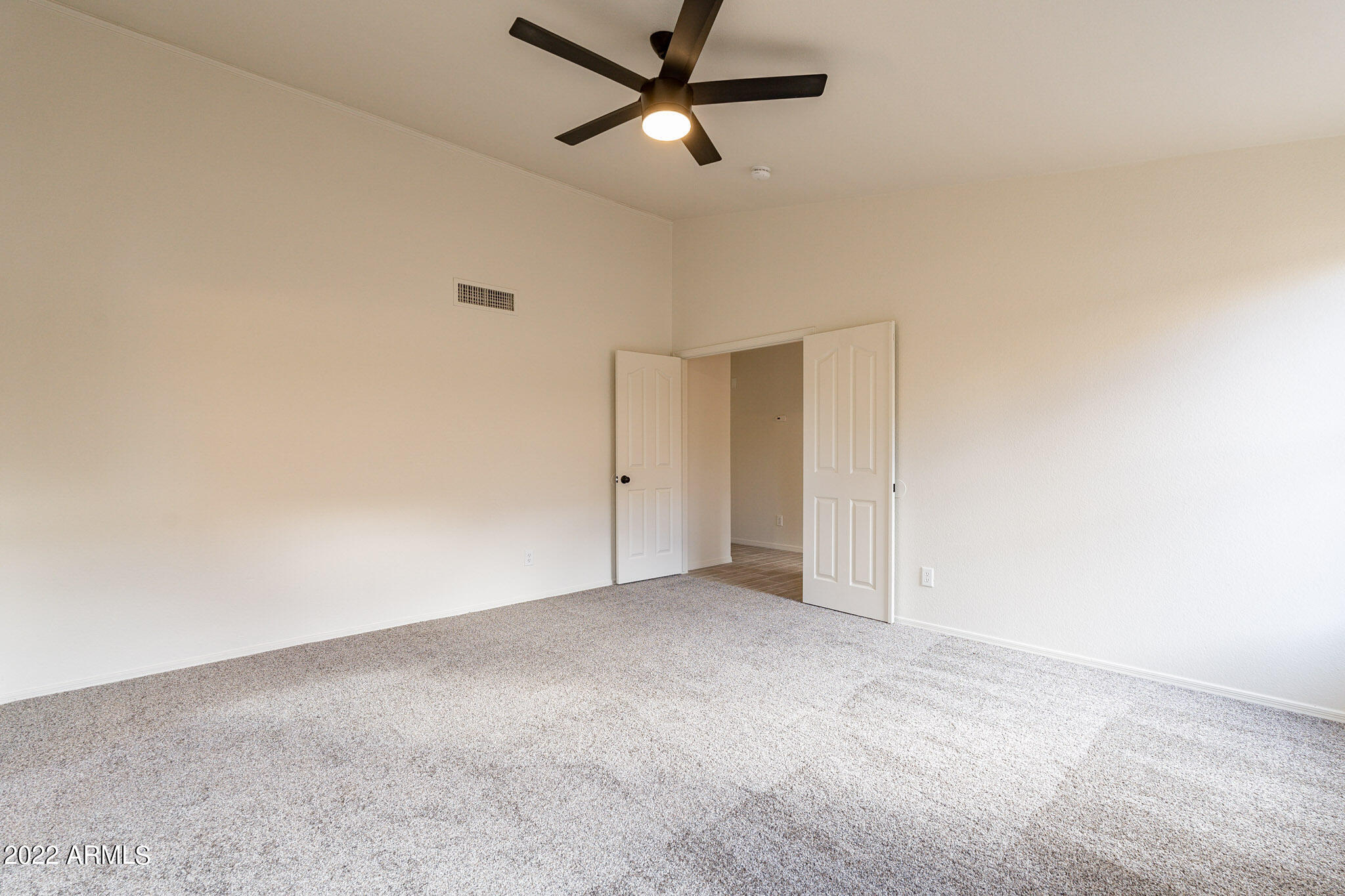 12454 West Granada Road Avondale, AZ 85392 - Photo 23 of 37 Primary Bedroom